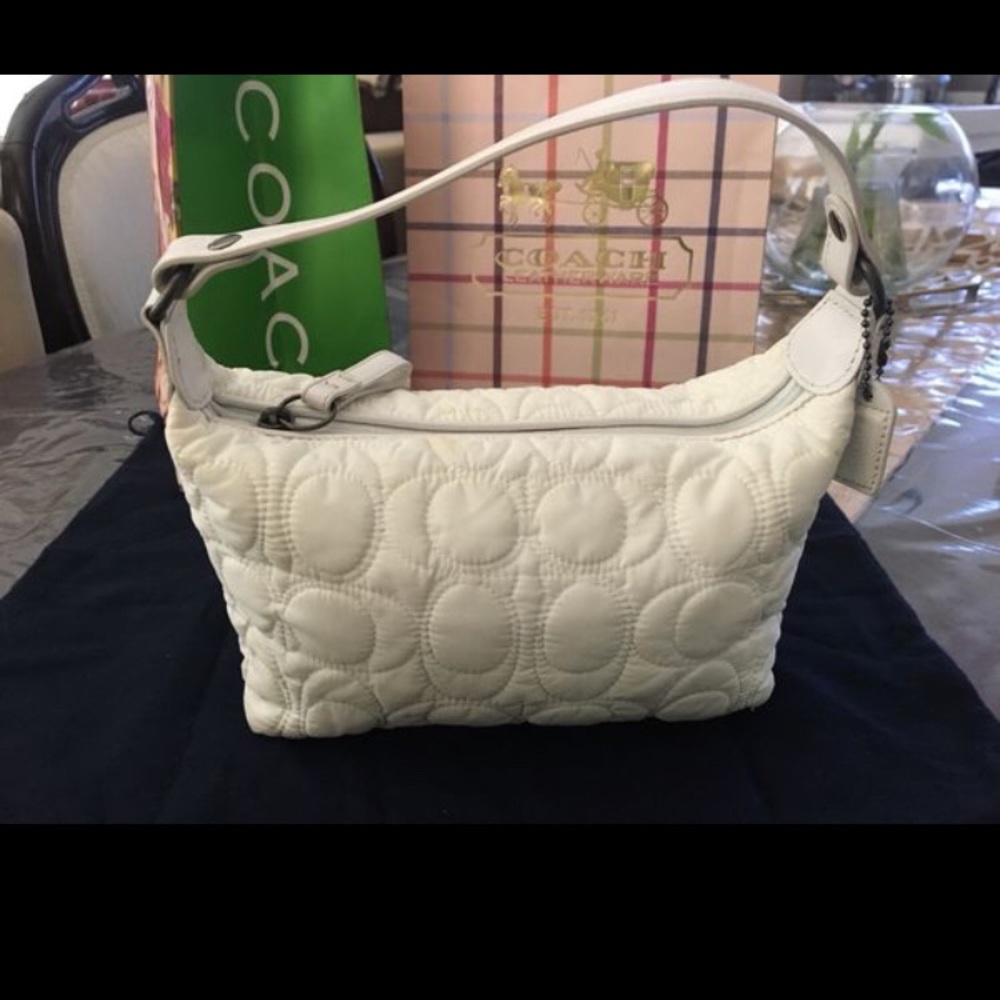 White coach bucket purse